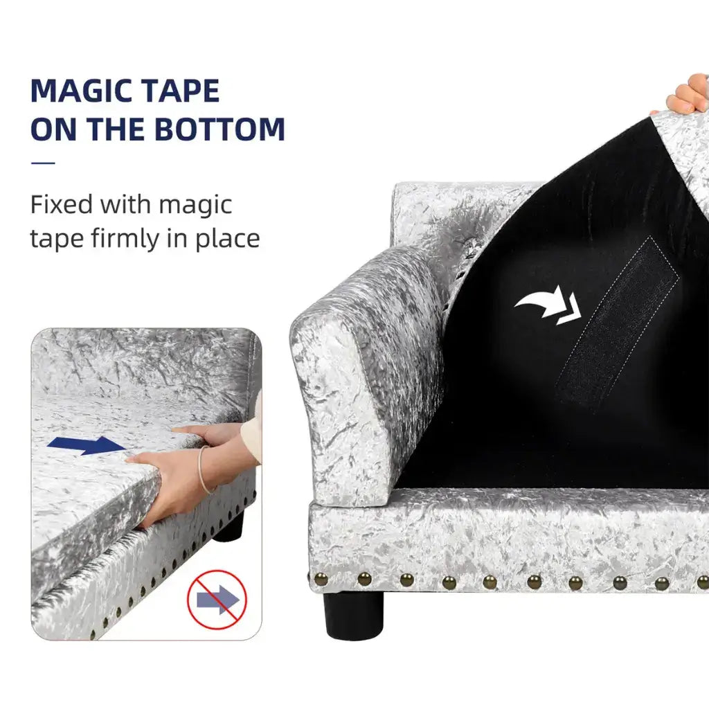 dog Sofa with a black cover fixed with magic tape on a white background