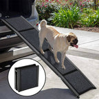 Dog using a black pet ramp to get into a vehicle with a close-up of the ramp's textured surface.