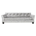 Gray textured large gray dog sofa with buttoned backrest on a white background