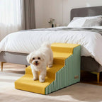 Small white dog on a yellow and green pet ramp in a bedroom.